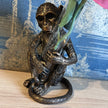 Bronze Monkey holding a Vase