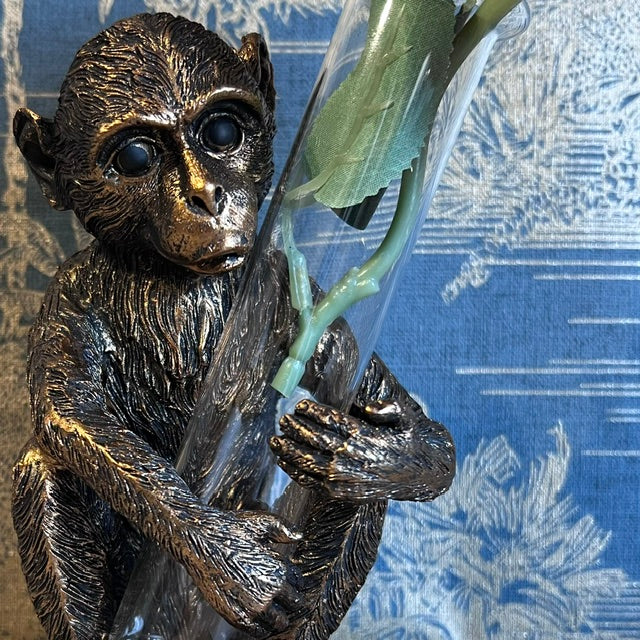 Bronze Monkey holding a Vase